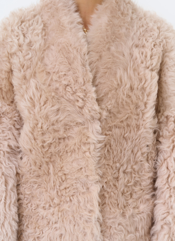 Женская короткая двухсторонняя дубленка 